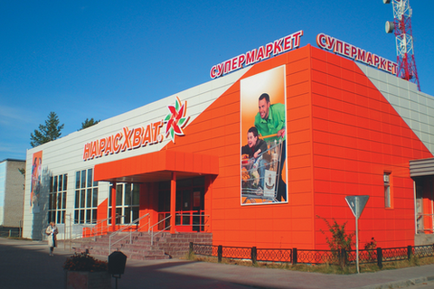 Отделка сайдингом магазина фото